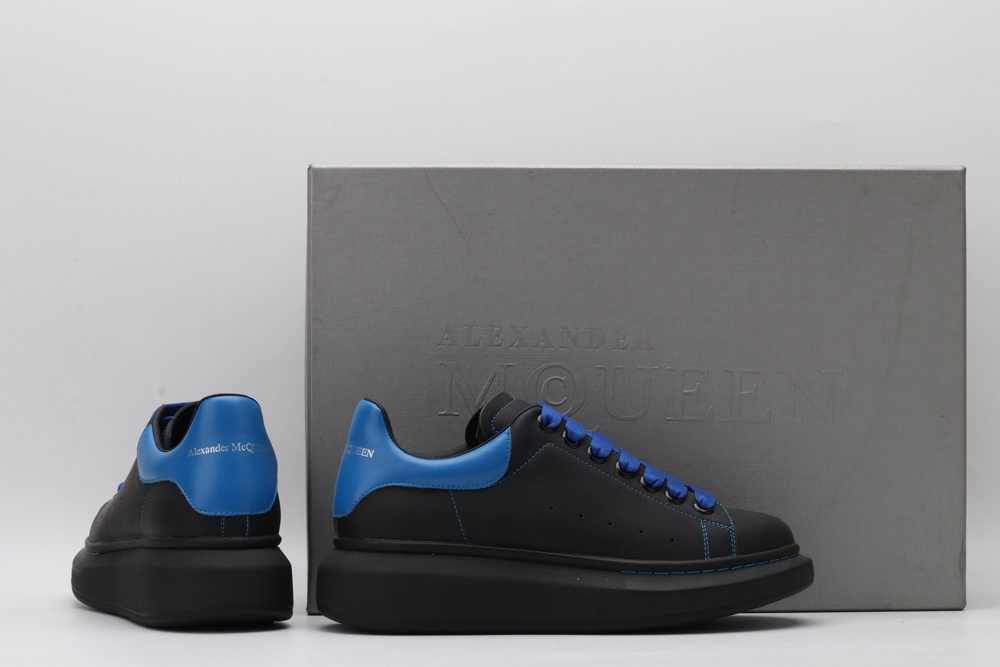 AMQ black oversized sneakers with blue heel