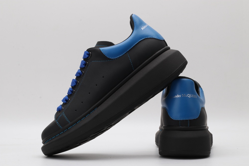 AMQ black oversized sneakers with blue heel