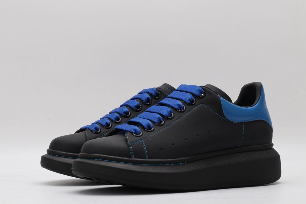 AMQ black oversized sneakers with blue heel