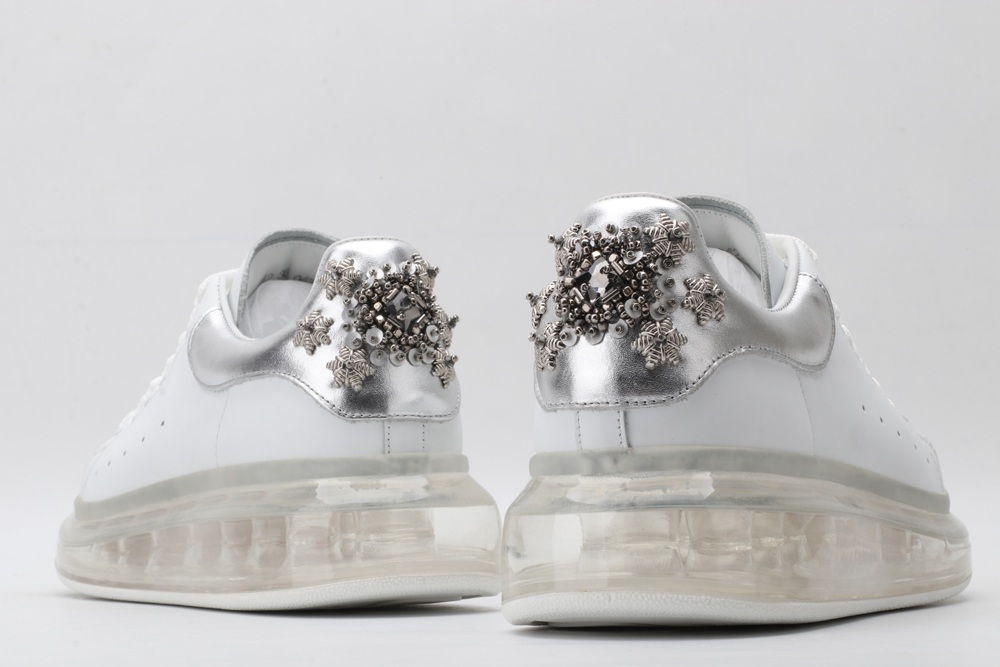 AMQ white oversized sneakers with siL*Ver heel