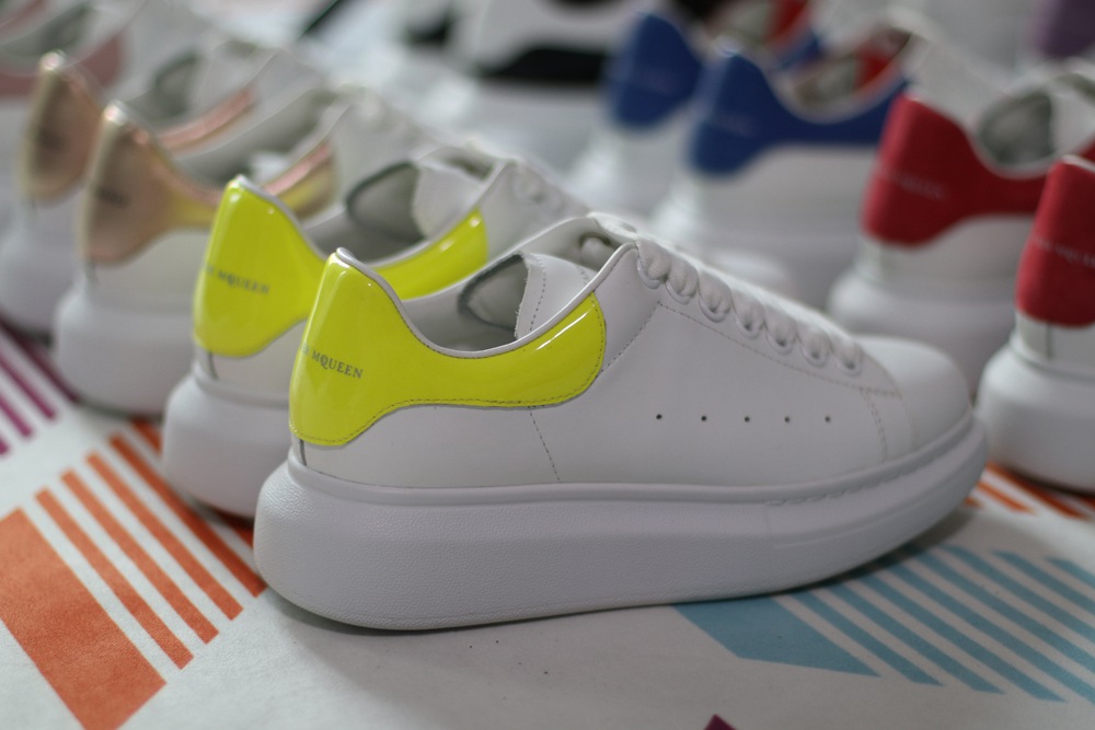 AMQ yellow foil embellished chunky leather sneakers
