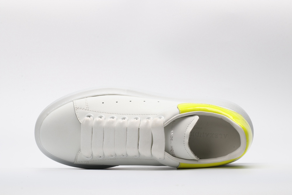 AMQ yellow foil embellished chunky leather sneakers