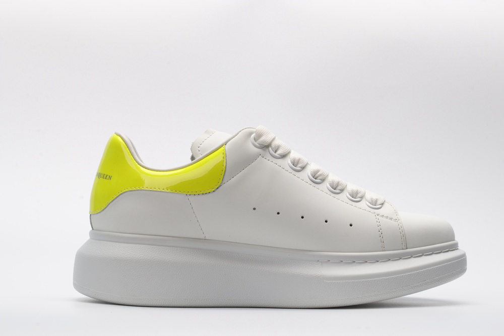 AMQ yellow foil embellished chunky leather sneakers