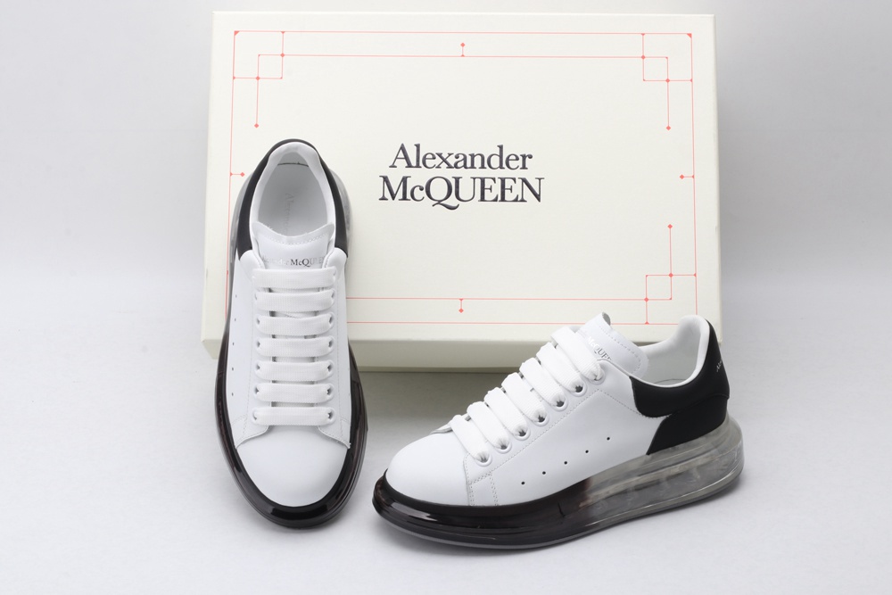 AMQ white oversized sneakers with black heel