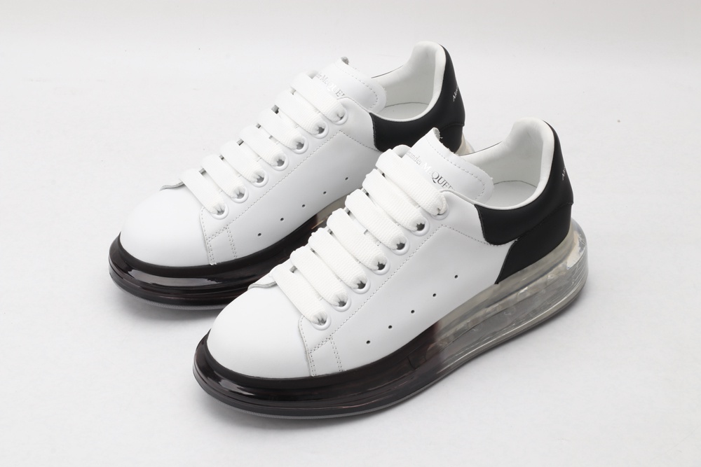 AMQ white oversized sneakers with black heel