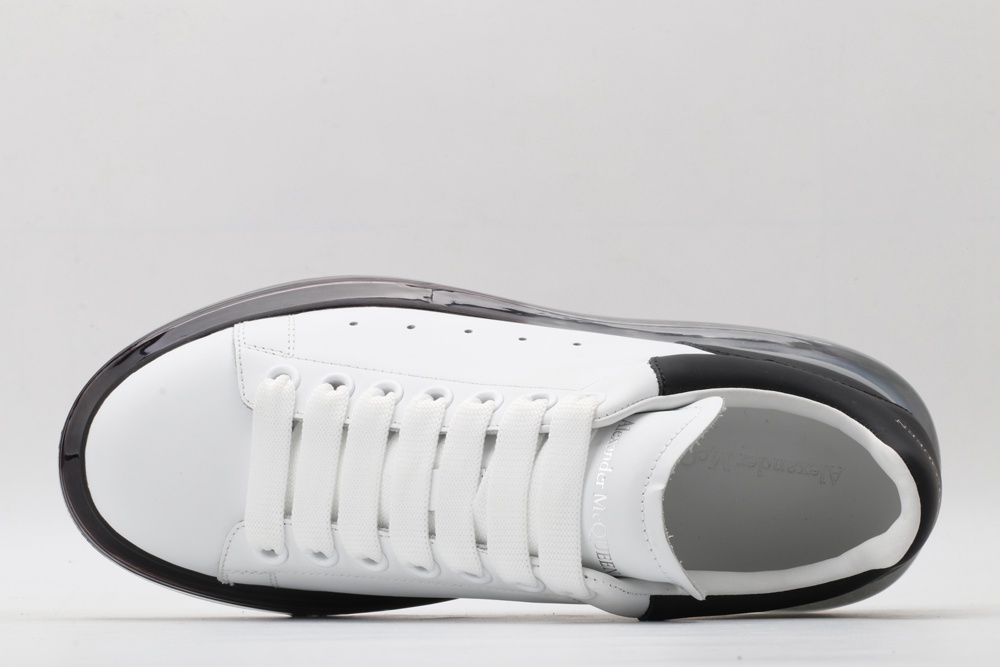 AMQ white oversized sneakers with black heel