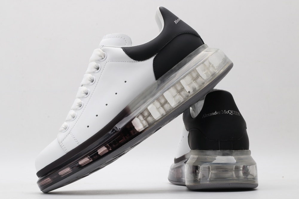 AMQ white oversized sneakers with black heel