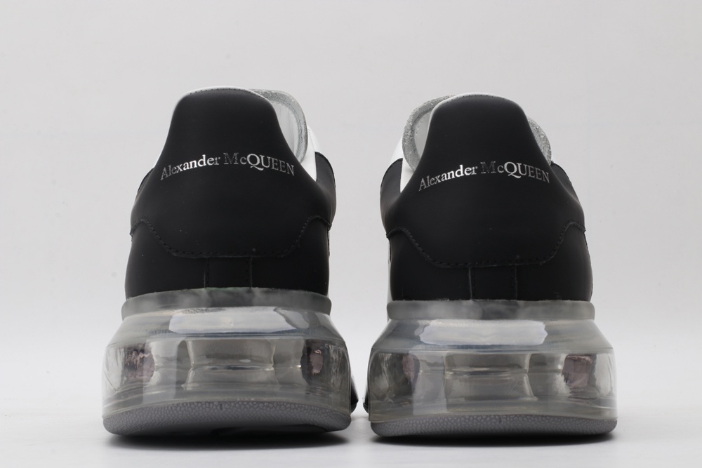 AMQ white oversized sneakers with black heel