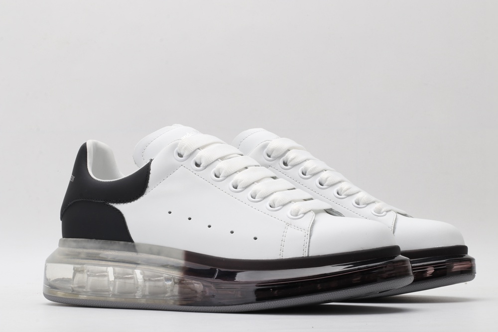 AMQ white oversized sneakers with black heel