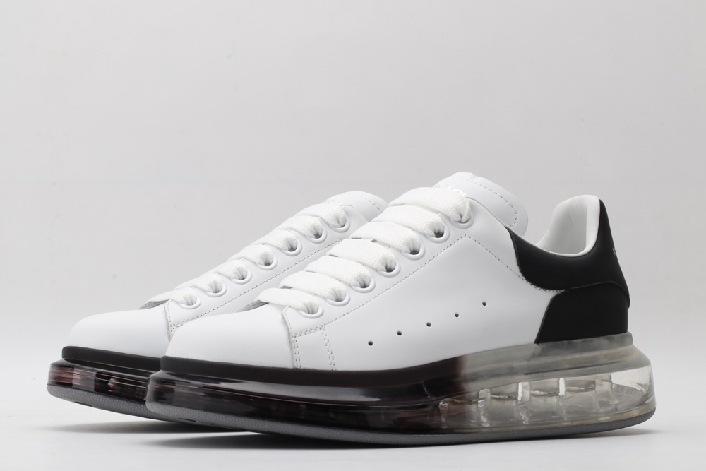 AMQ white oversized sneakers with black heel