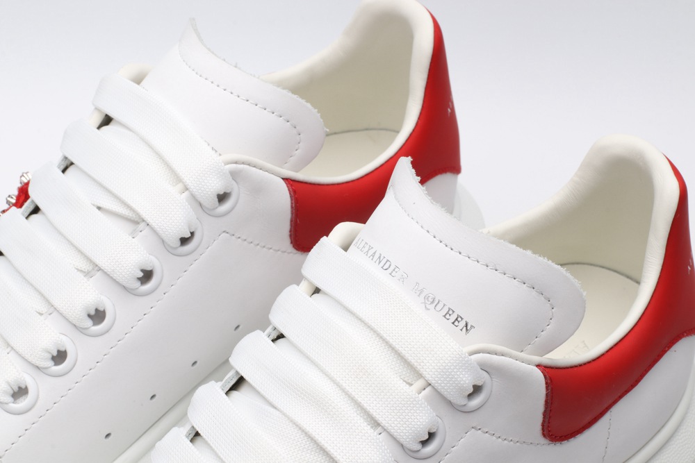 AMQ oversized sneakers with red heel