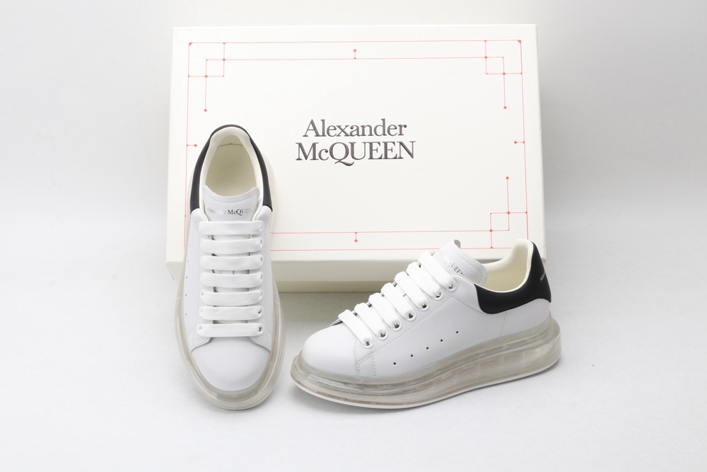 AMQ white oversized sneakers with black heel
