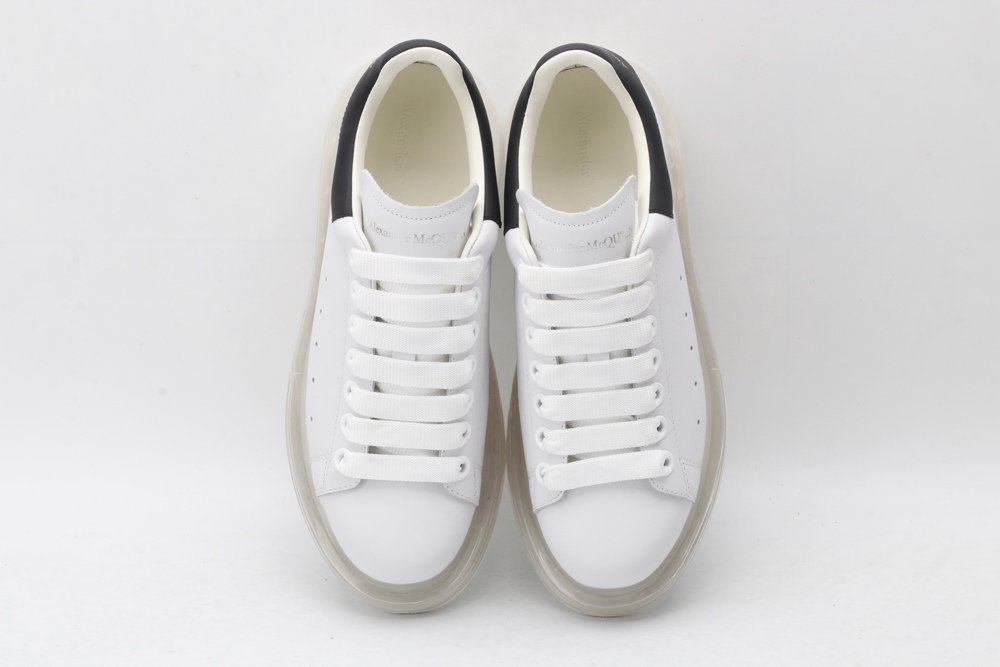 AMQ white oversized sneakers with black heel