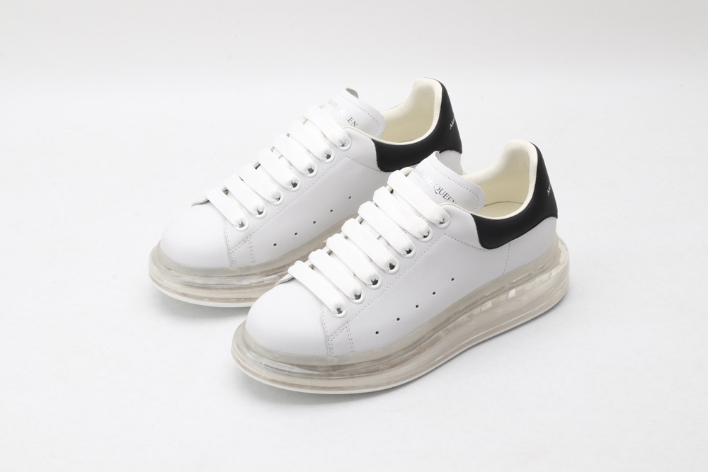AMQ white oversized sneakers with black heel
