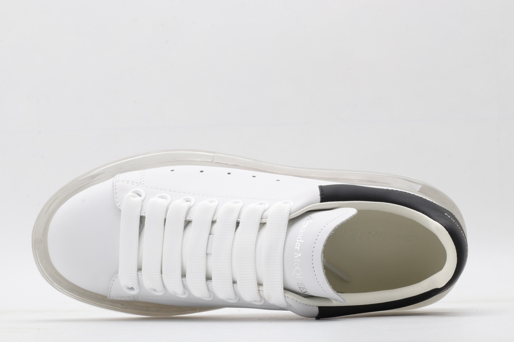 AMQ white oversized sneakers with black heel