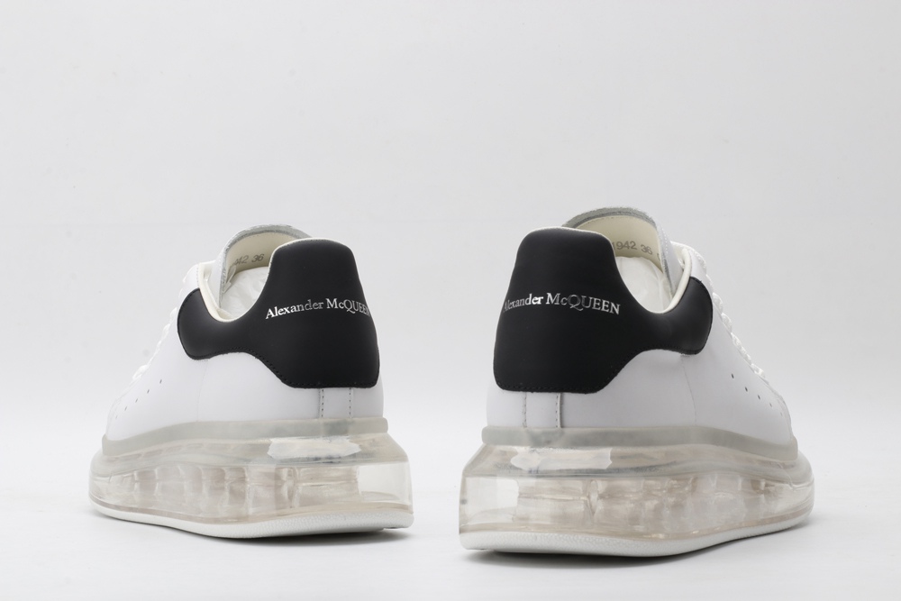 AMQ white oversized sneakers with black heel