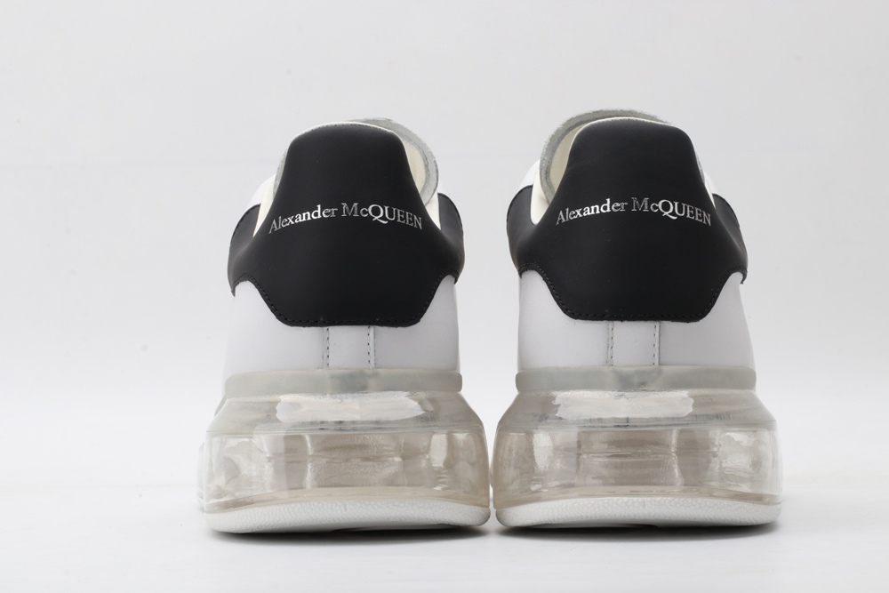 AMQ white oversized sneakers with black heel