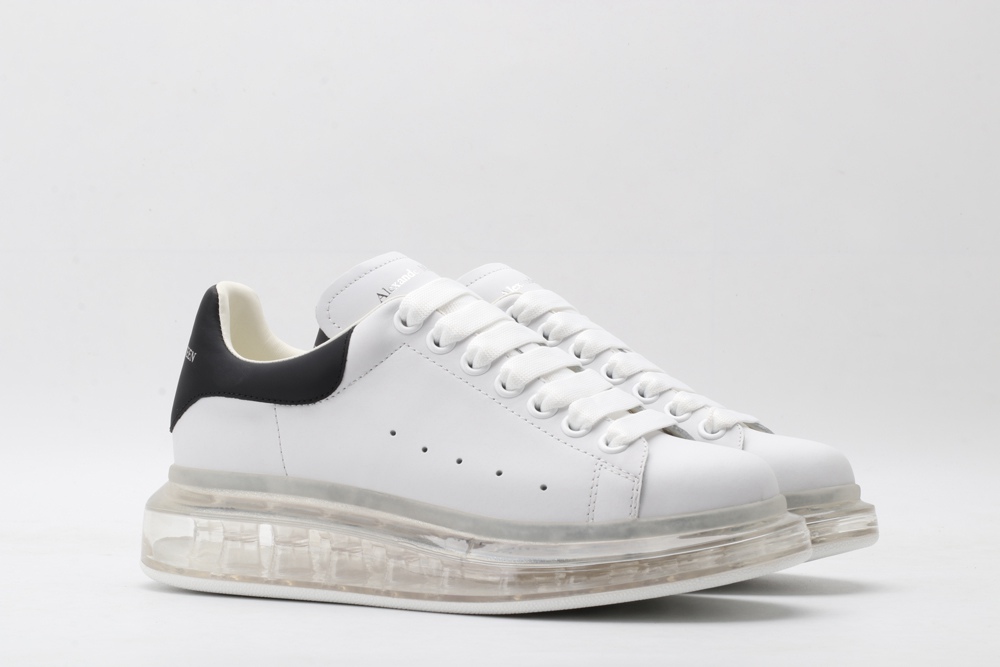 AMQ white oversized sneakers with black heel