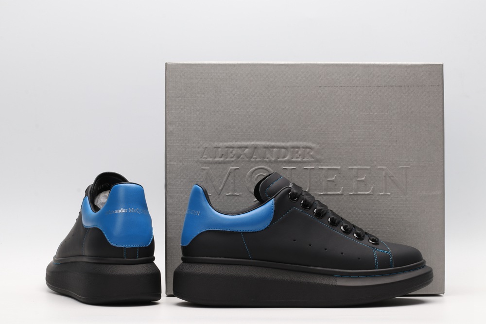 AMQ black oversized sneakers with blue heel