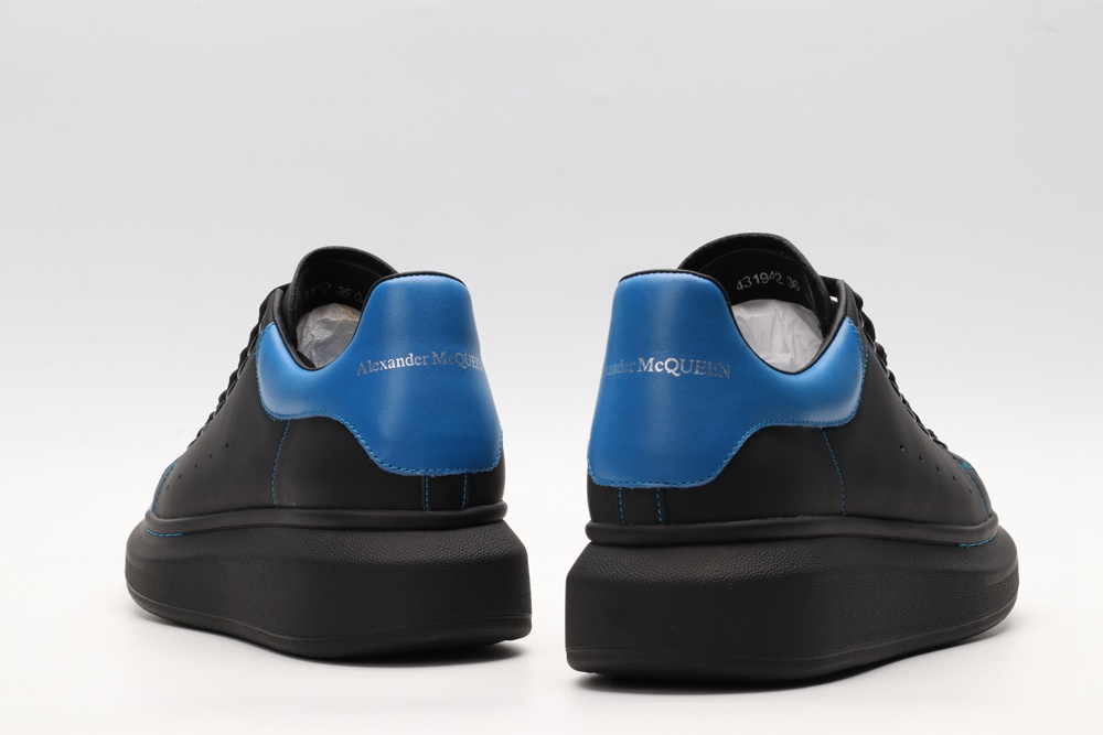 AMQ black oversized sneakers with blue heel