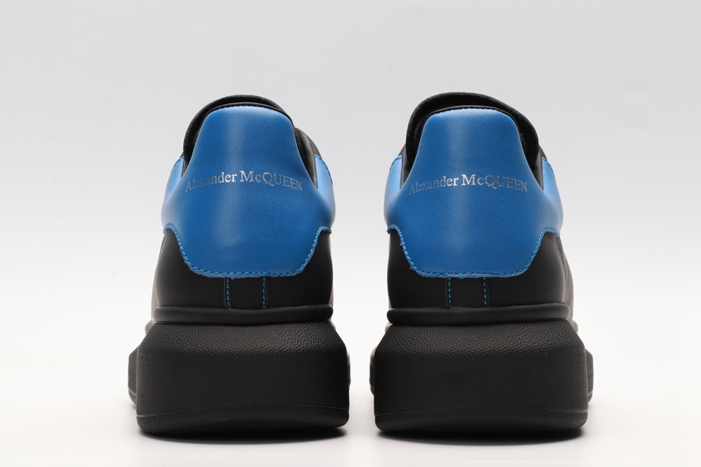 AMQ black oversized sneakers with blue heel
