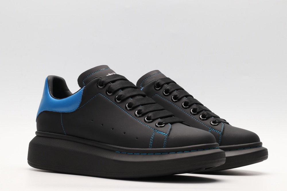AMQ black oversized sneakers with blue heel