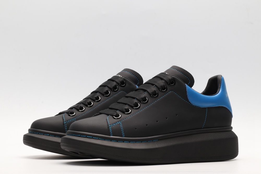 AMQ black oversized sneakers with blue heel