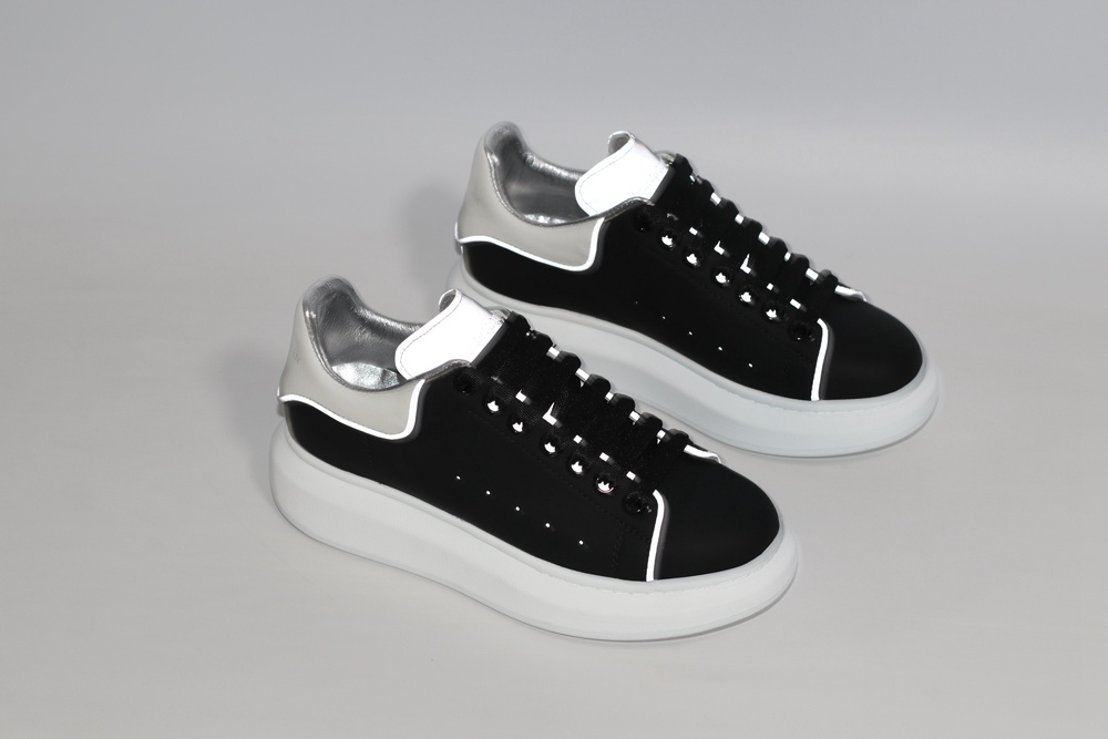 AMQ black oversized sneakers with siL*Ver heel
