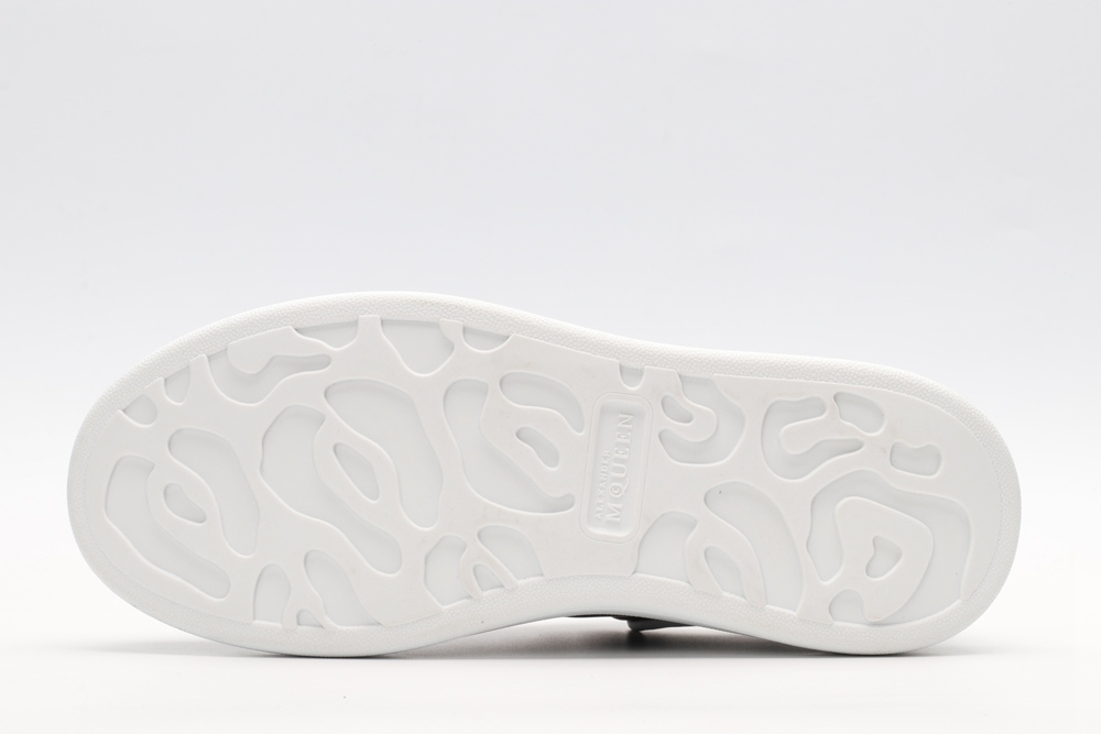 AMQ black oversized sneakers with siL*Ver heel