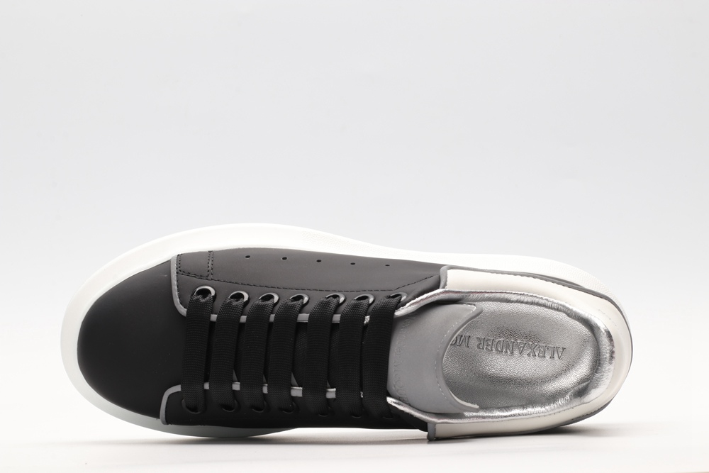 AMQ black oversized sneakers with siL*Ver heel