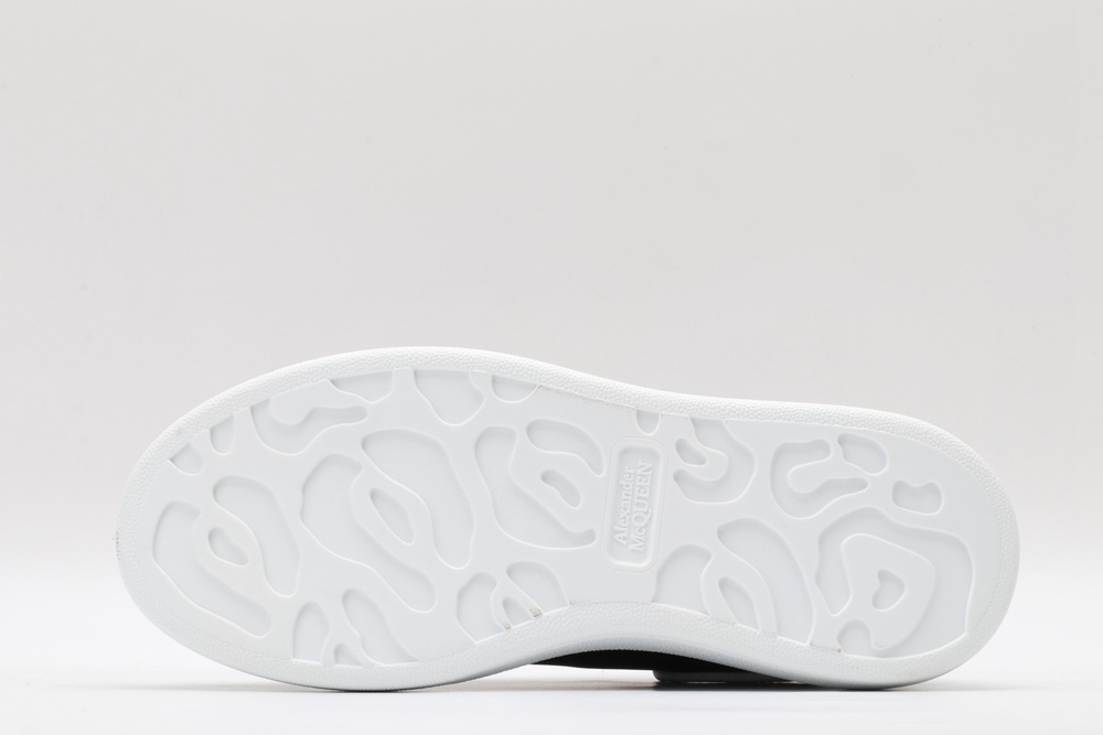 AMQ oversized black sneakers with white heel