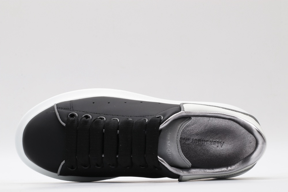 AMQ oversized black sneakers with white heel