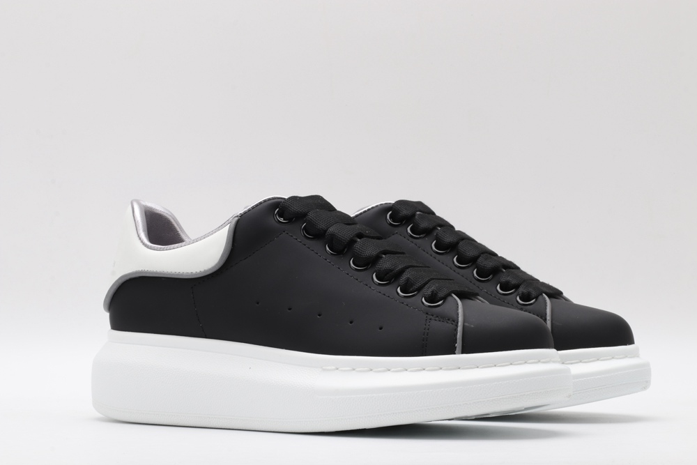 AMQ oversized black sneakers with white heel