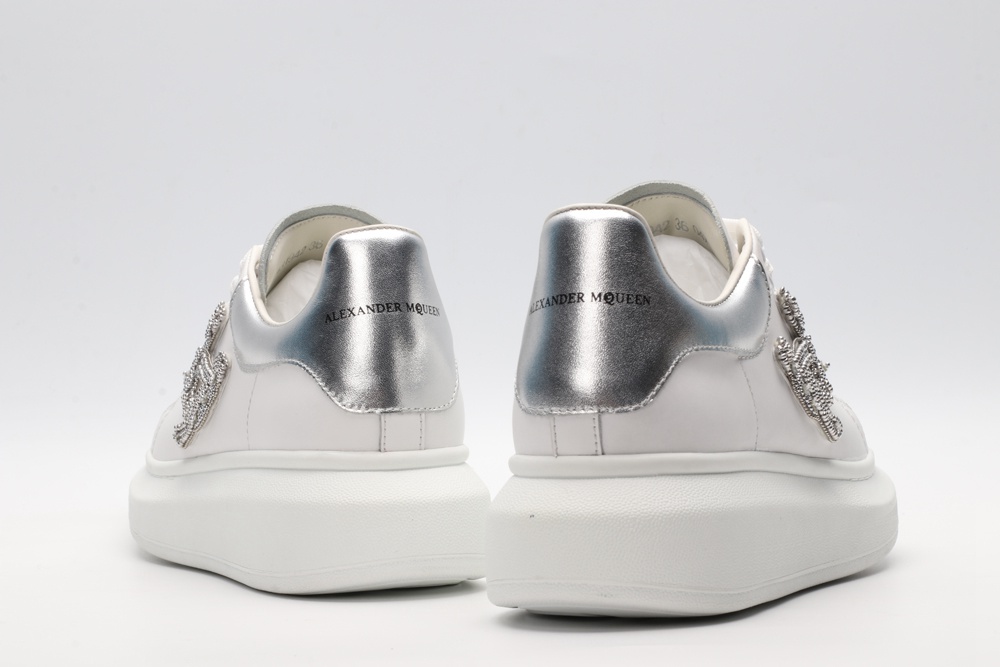 AMQ oversized sneakers with siL*Ver heel