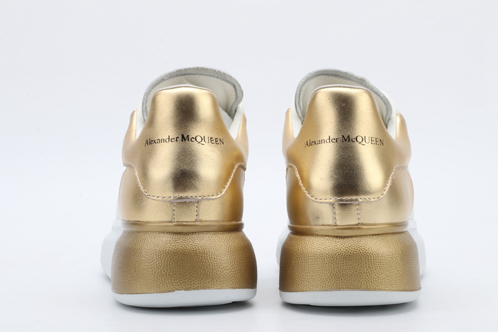 AMQ oversized sneakers with gold heel