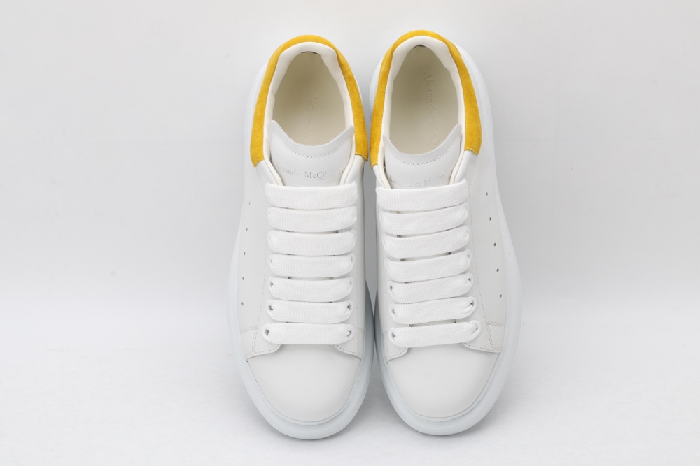 AMQ oversized sneakers with yellow heel