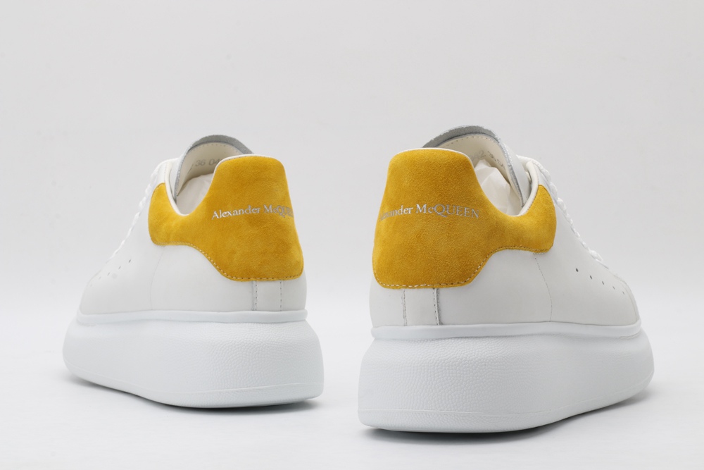 AMQ oversized sneakers with yellow heel