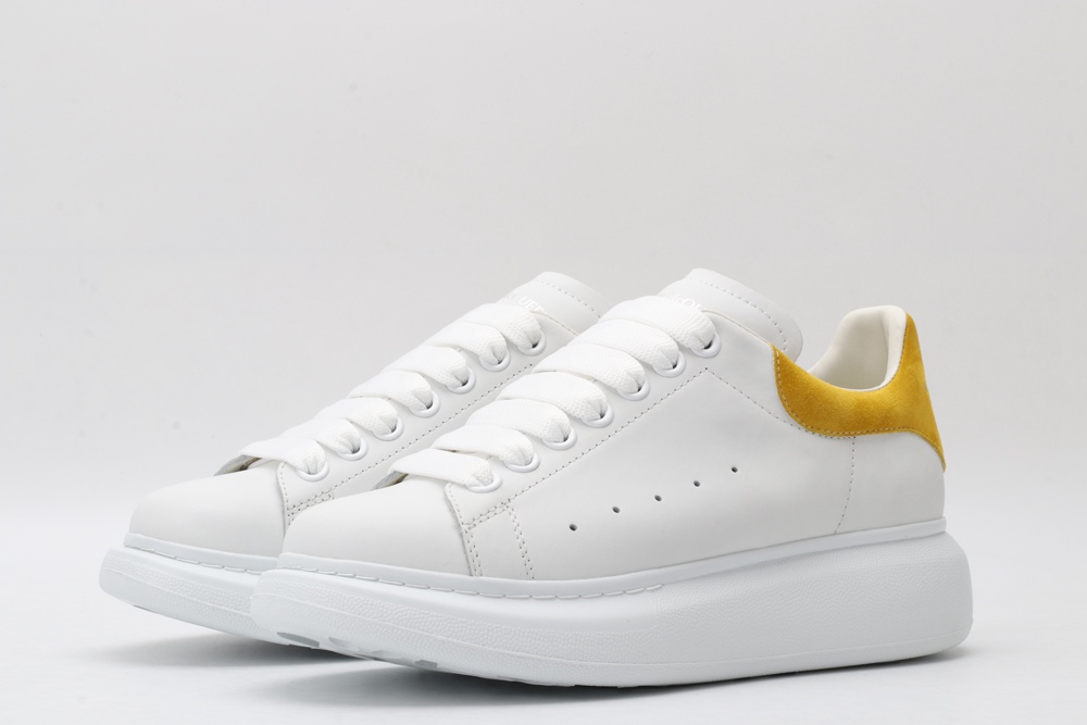AMQ oversized sneakers with yellow heel