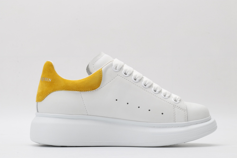 AMQ oversized sneakers with yellow heel