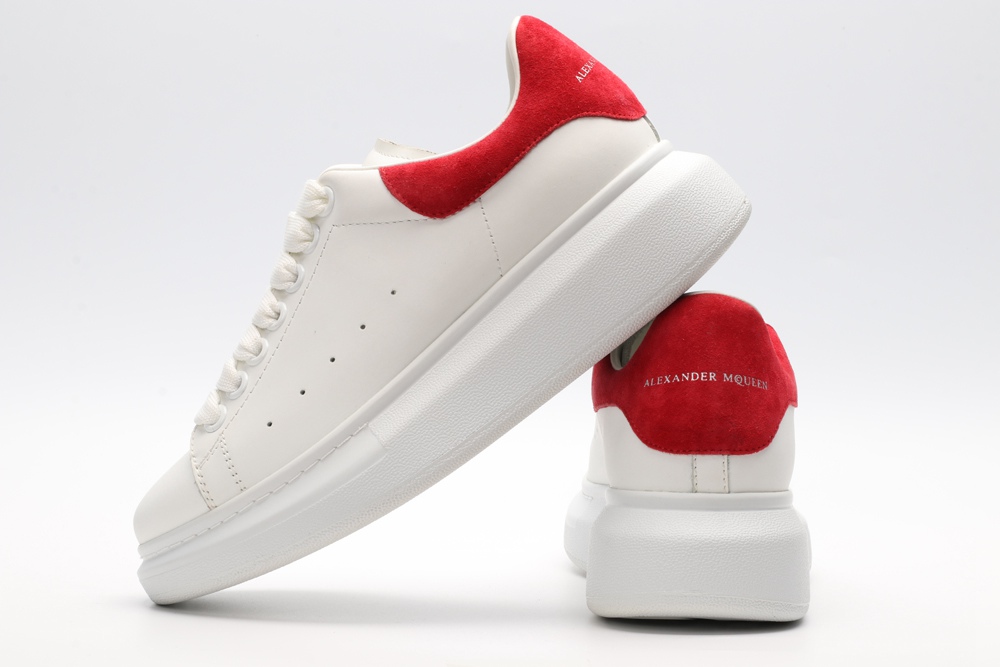 AMQ OVERSIZED SNEAKER with lust red suede heel