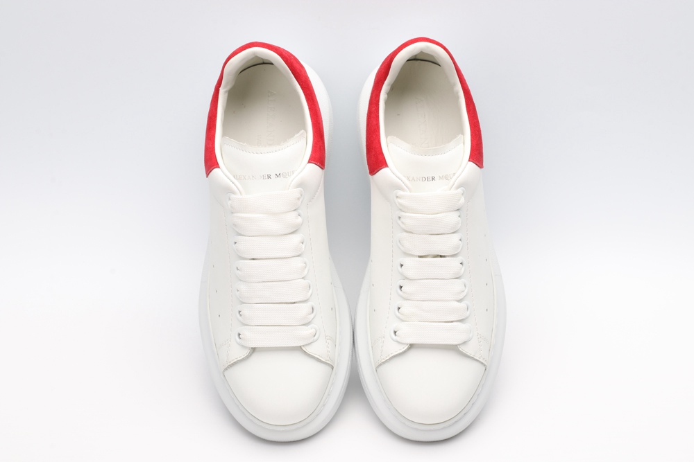 AMQ OVERSIZED SNEAKER with lust red suede heel