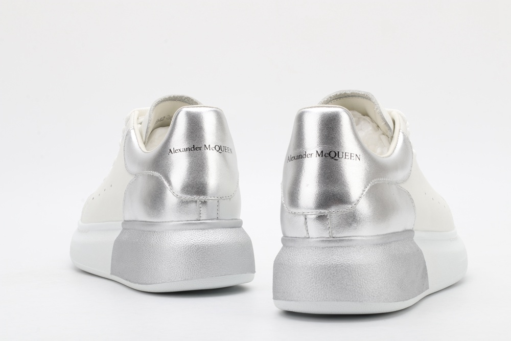 AMQ oversized sneakers with siL*Ver heel