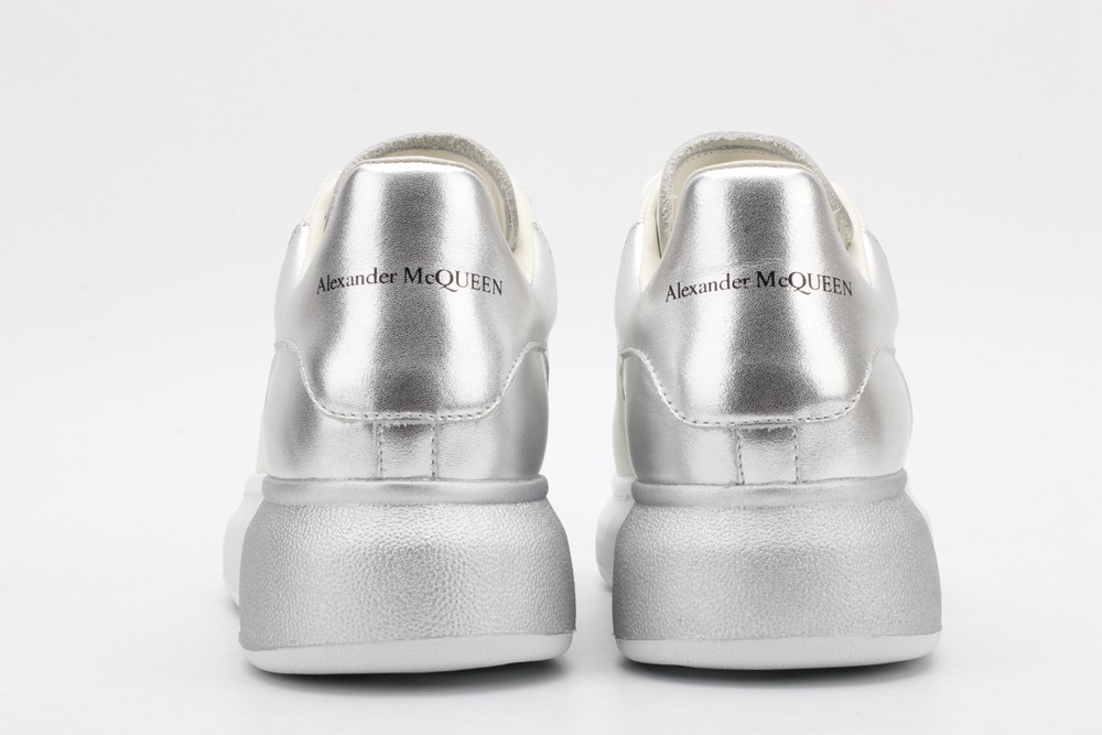 AMQ oversized sneakers with siL*Ver heel