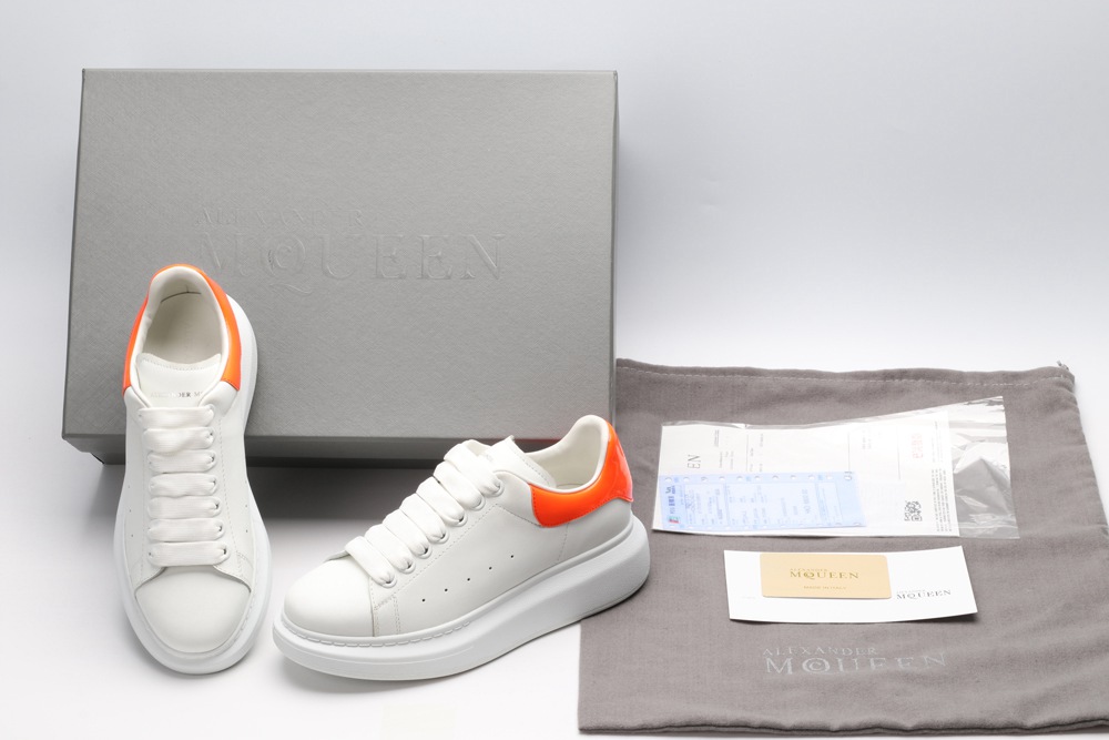 AMQ OVERSIZED SNEAKER with orange heel