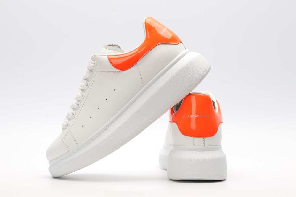 AMQ OVERSIZED SNEAKER with orange heel