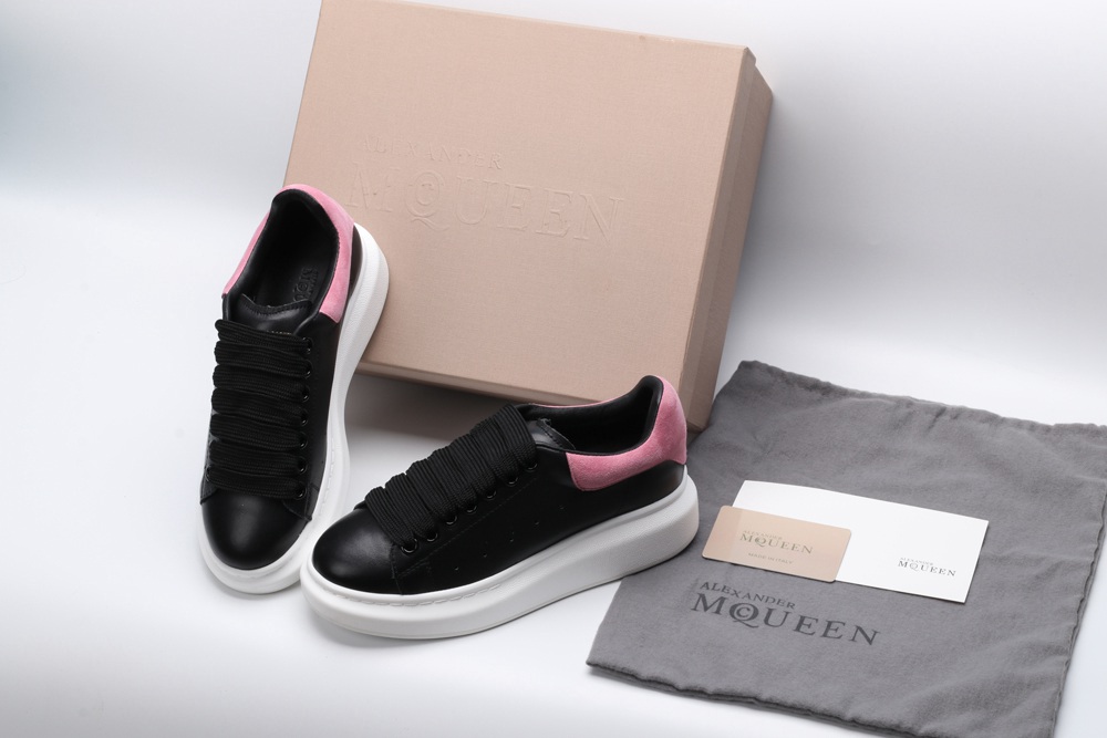 AMQ oversized black sneakers with rose heel