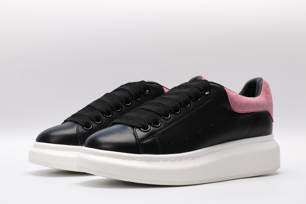 AMQ oversized black sneakers with rose heel