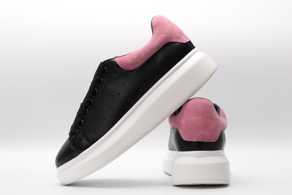 AMQ oversized black sneakers with rose heel