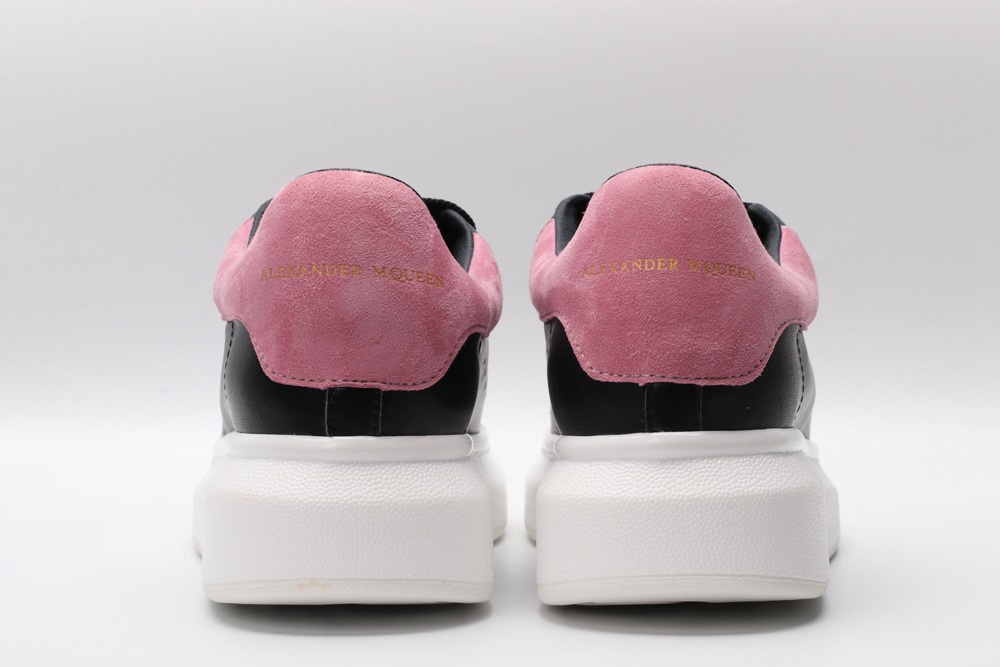 AMQ oversized black sneakers with rose heel