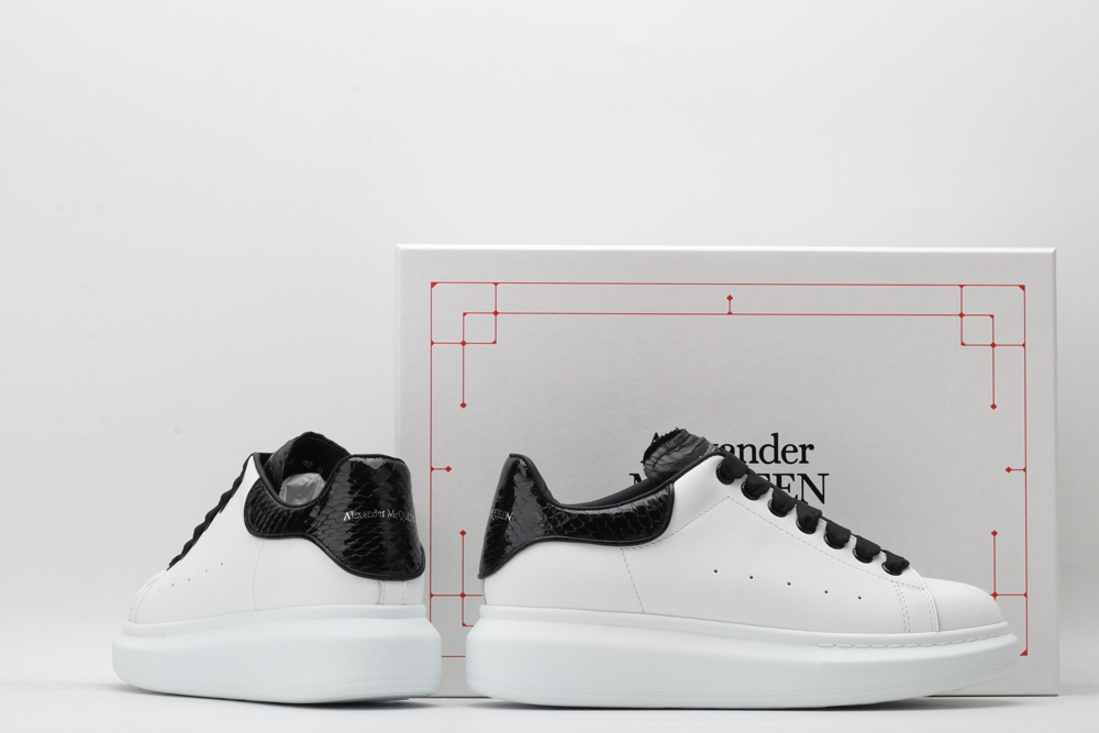 AMQ OVERSIZED SNEAKER with blue stamped python heel